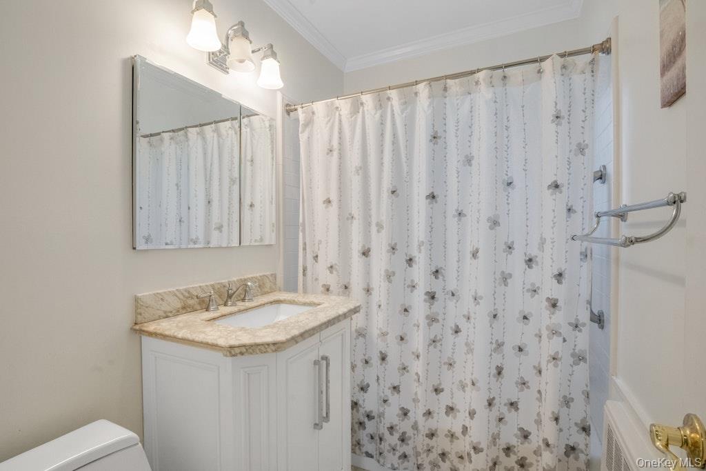 590 Bedford Road, Unit 2 Pleasantville, NY 10570 - Photo 21 of 30 Beautiful updated bathroom featuring a full tub, offering both comfort and style.