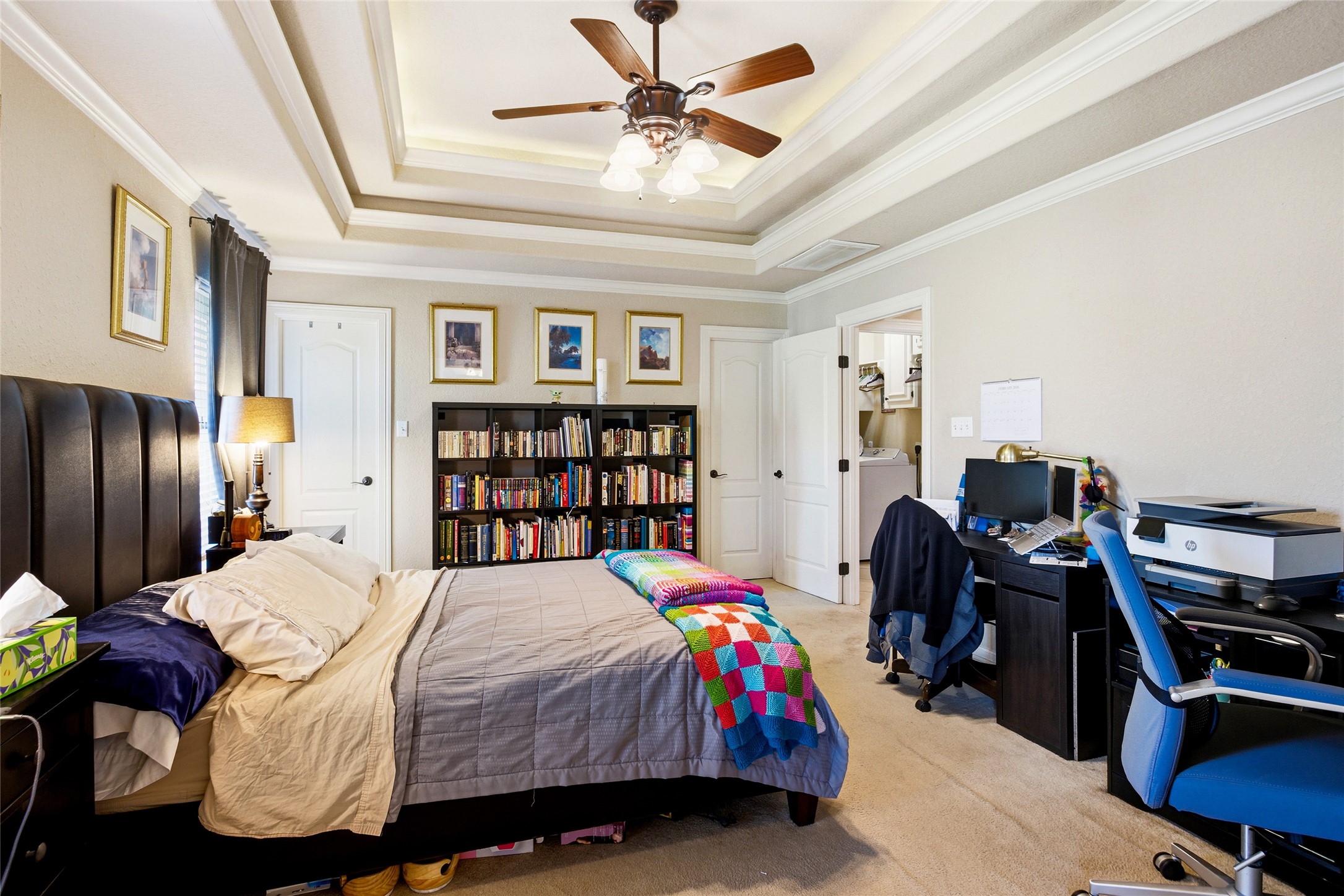104 Hamilton Clute, TX 77531 - Photo 11 of 25 a bedroom with a bed furniture and a chandelier