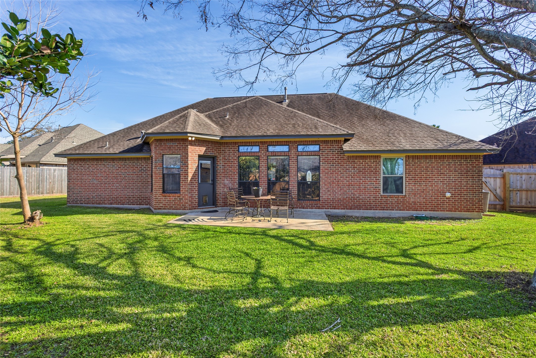 104 Hamilton Clute, TX 77531 - Photo 20 of 25 a front view of a house with yard and green space