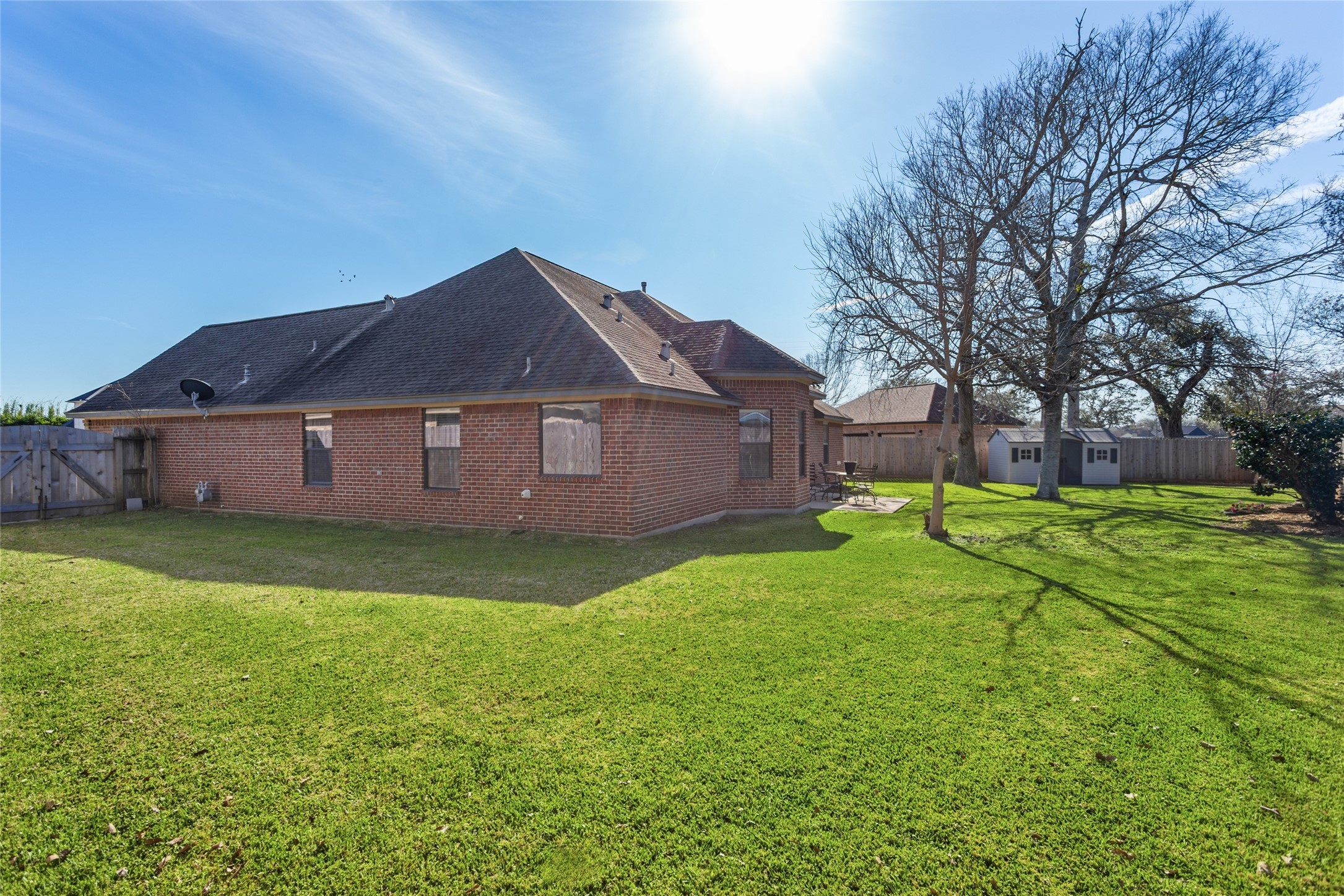 104 Hamilton Clute, TX 77531 - Photo 22 of 25 a house view with a garden space