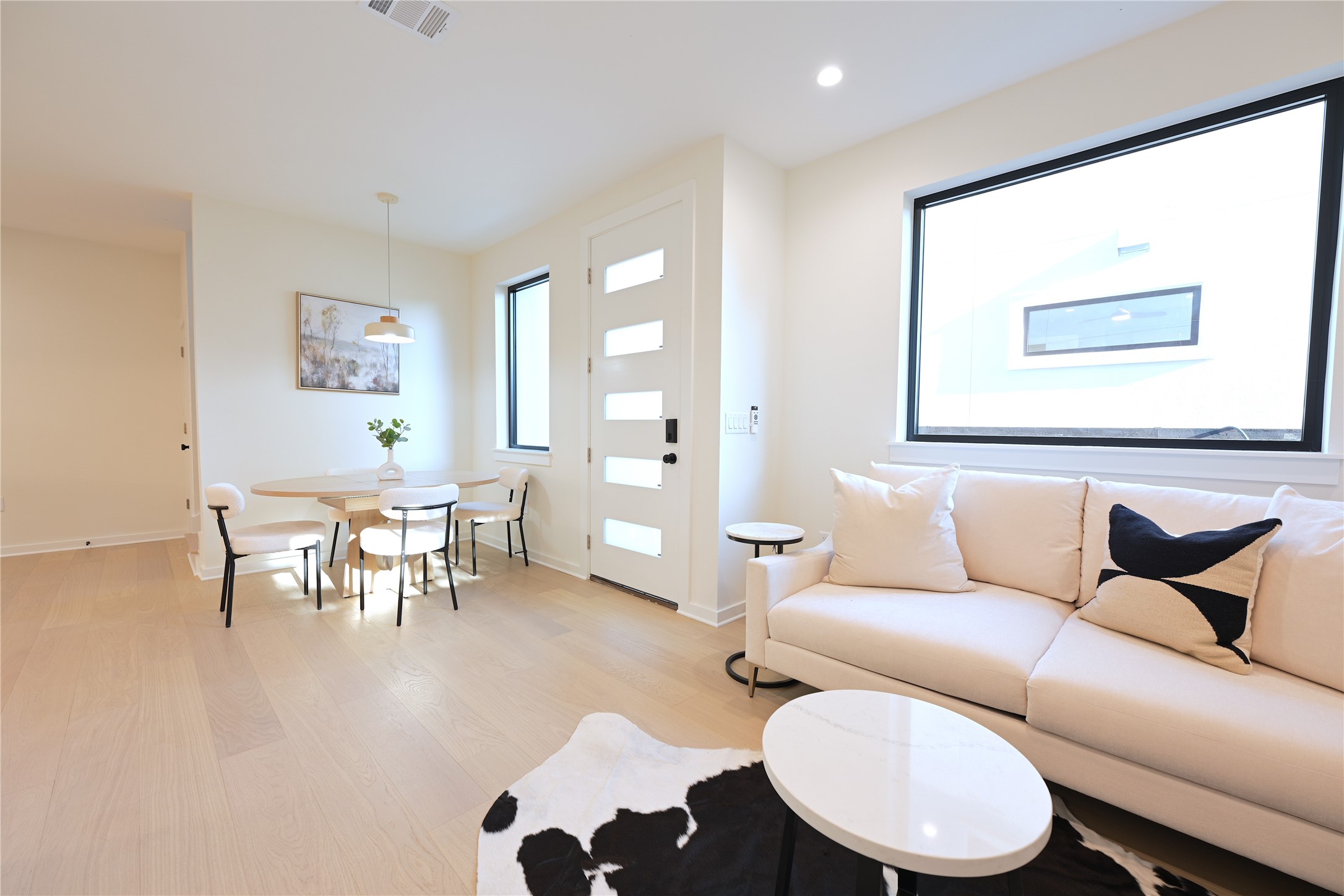 4410 Glomar Avenue, Unit 2 Austin, TX 78721 - Photo 5 of 24 This open-concept living space with large windows providing natural light