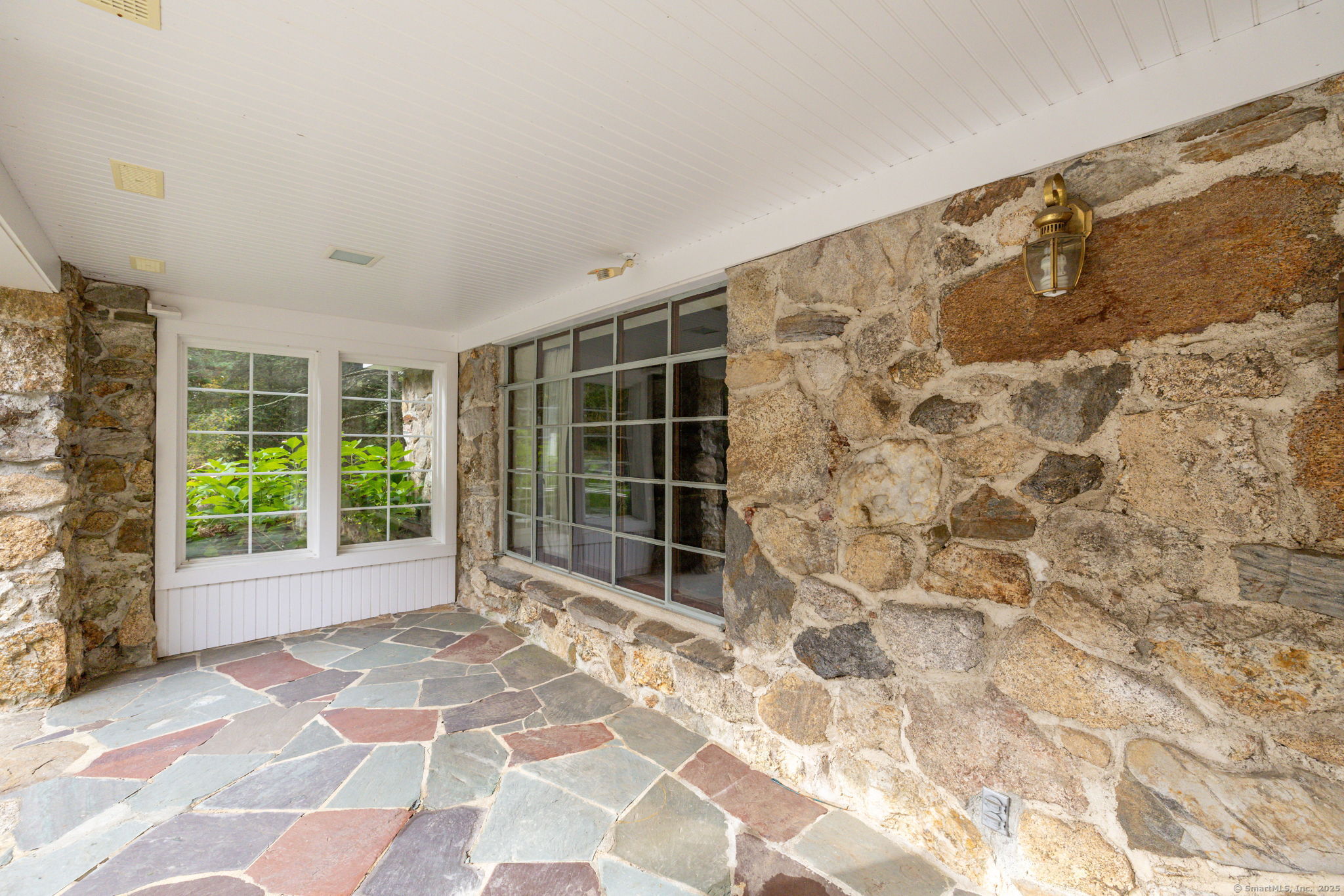 418 Plymouth Road Harwinton, CT 06791 - Photo 11 of 37 a view of empty room with windows