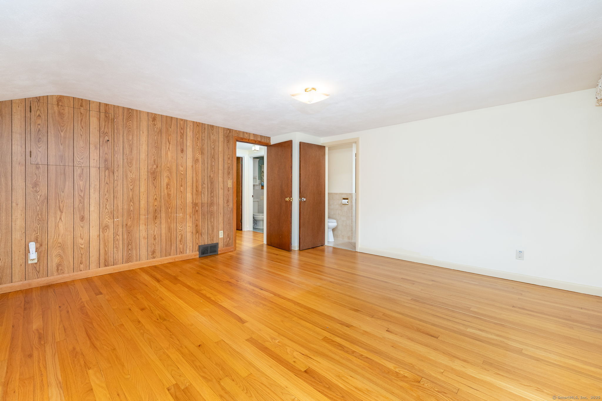 418 Plymouth Road Harwinton, CT 06791 - Photo 20 of 37 a view of an empty room with wooden floor