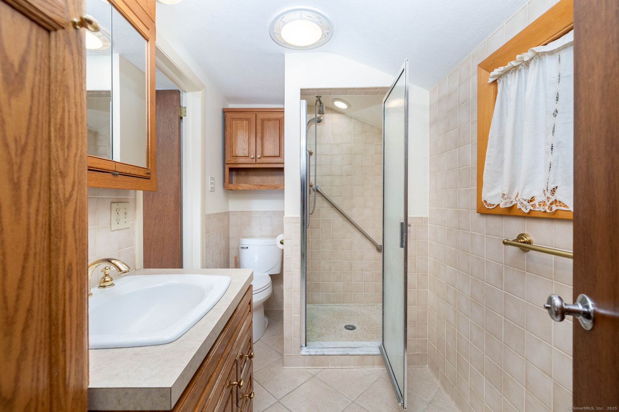 418 Plymouth Road Harwinton, CT 06791 - Photo 21 of 37 a bathroom with a sink and a mirror