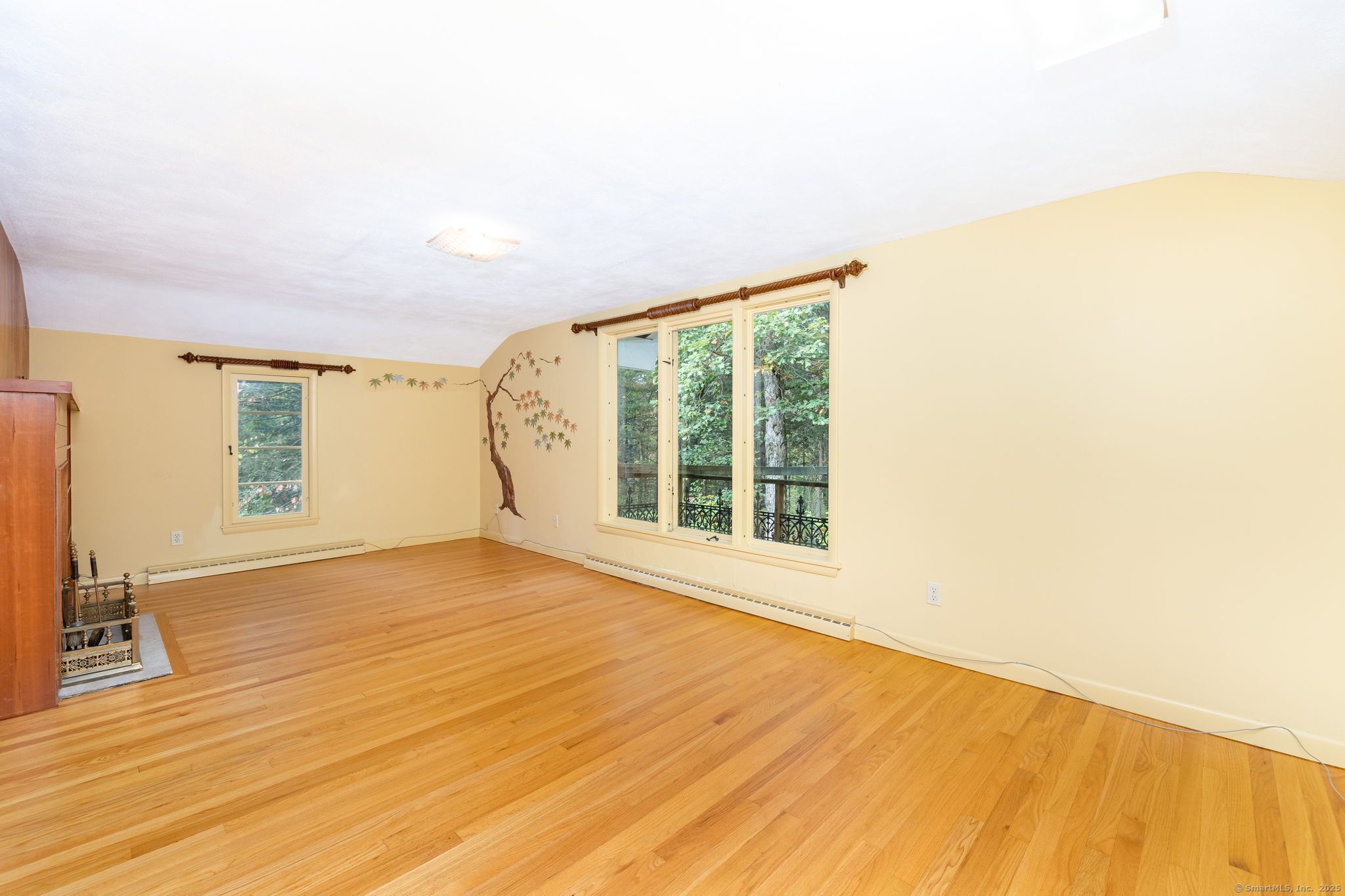 418 Plymouth Road Harwinton, CT 06791 - Photo 24 of 37 a view of an empty room with wooden floor and a window