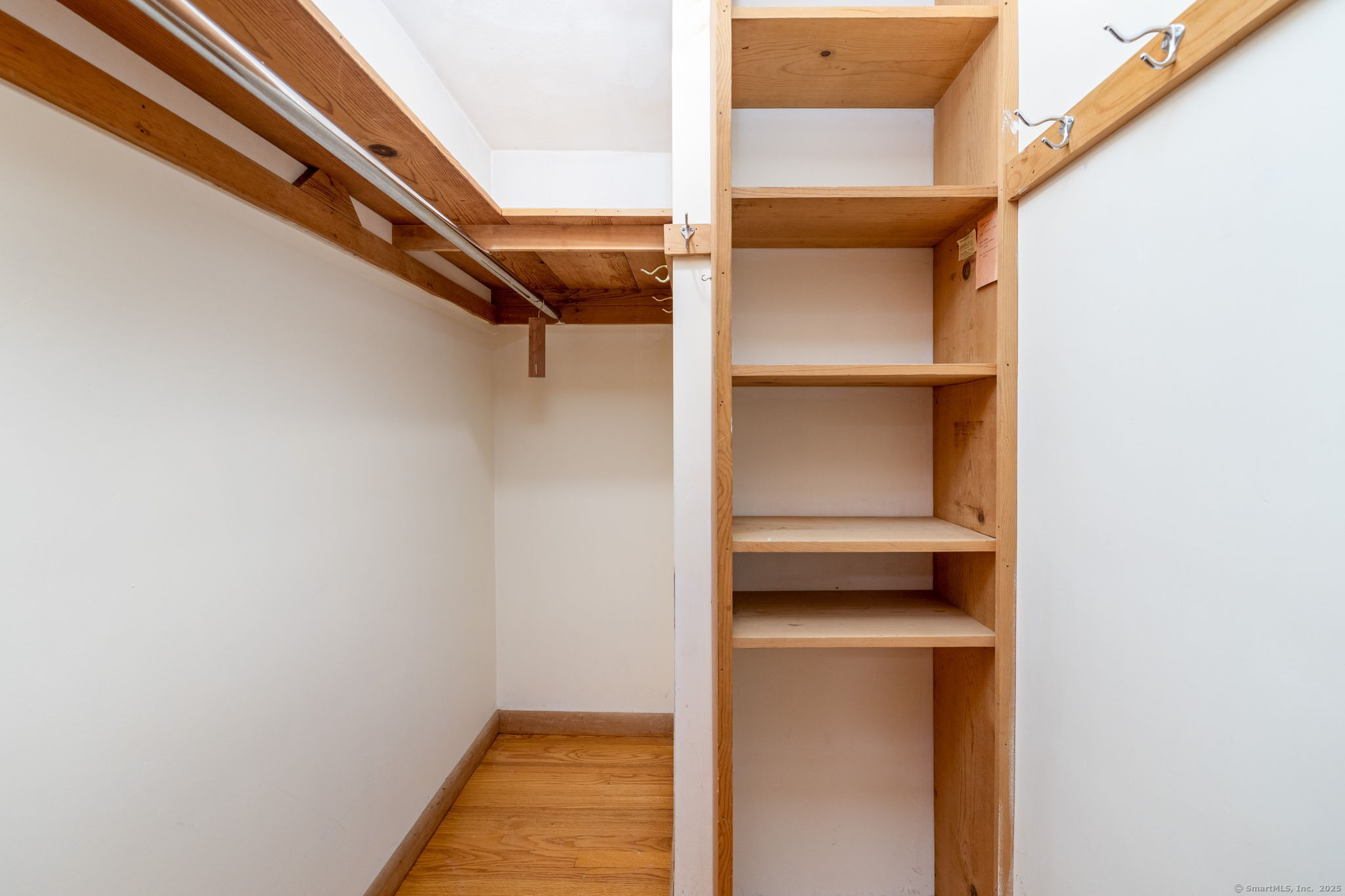418 Plymouth Road Harwinton, CT 06791 - Photo 25 of 37 a view of walk in closet with empty racks