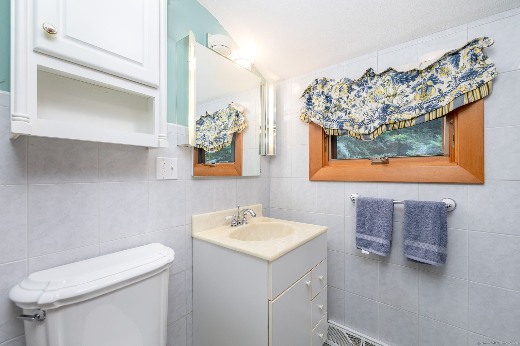 418 Plymouth Road Harwinton, CT 06791 - Photo 26 of 37 a bathroom with a sink a toilet and mirror