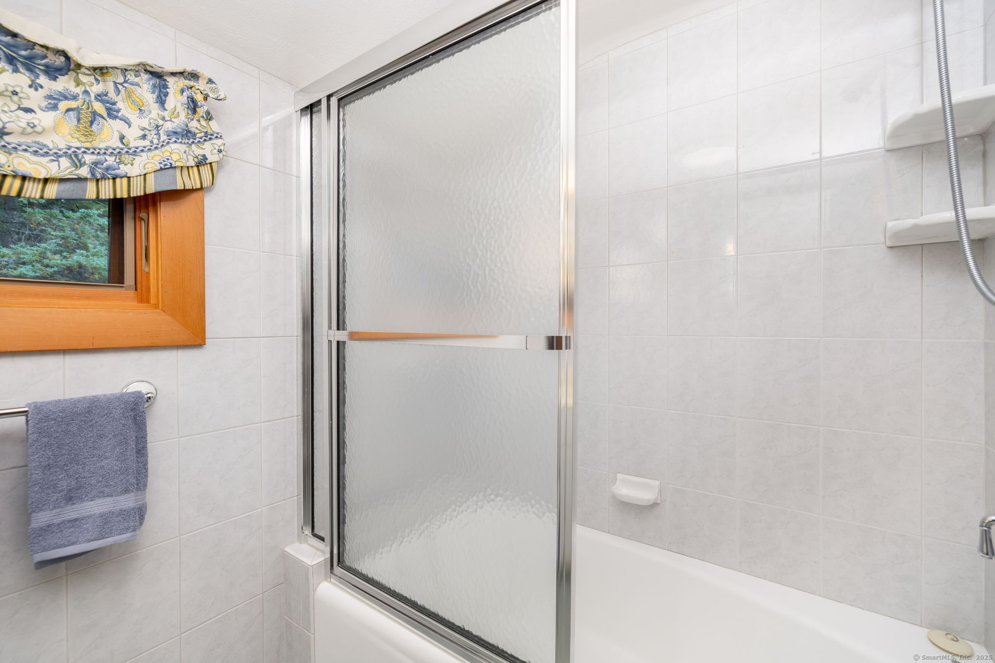 418 Plymouth Road Harwinton, CT 06791 - Photo 27 of 37 a bathroom with a shower and a glass door