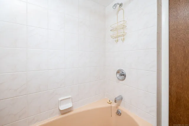 a bathroom with a bathtub