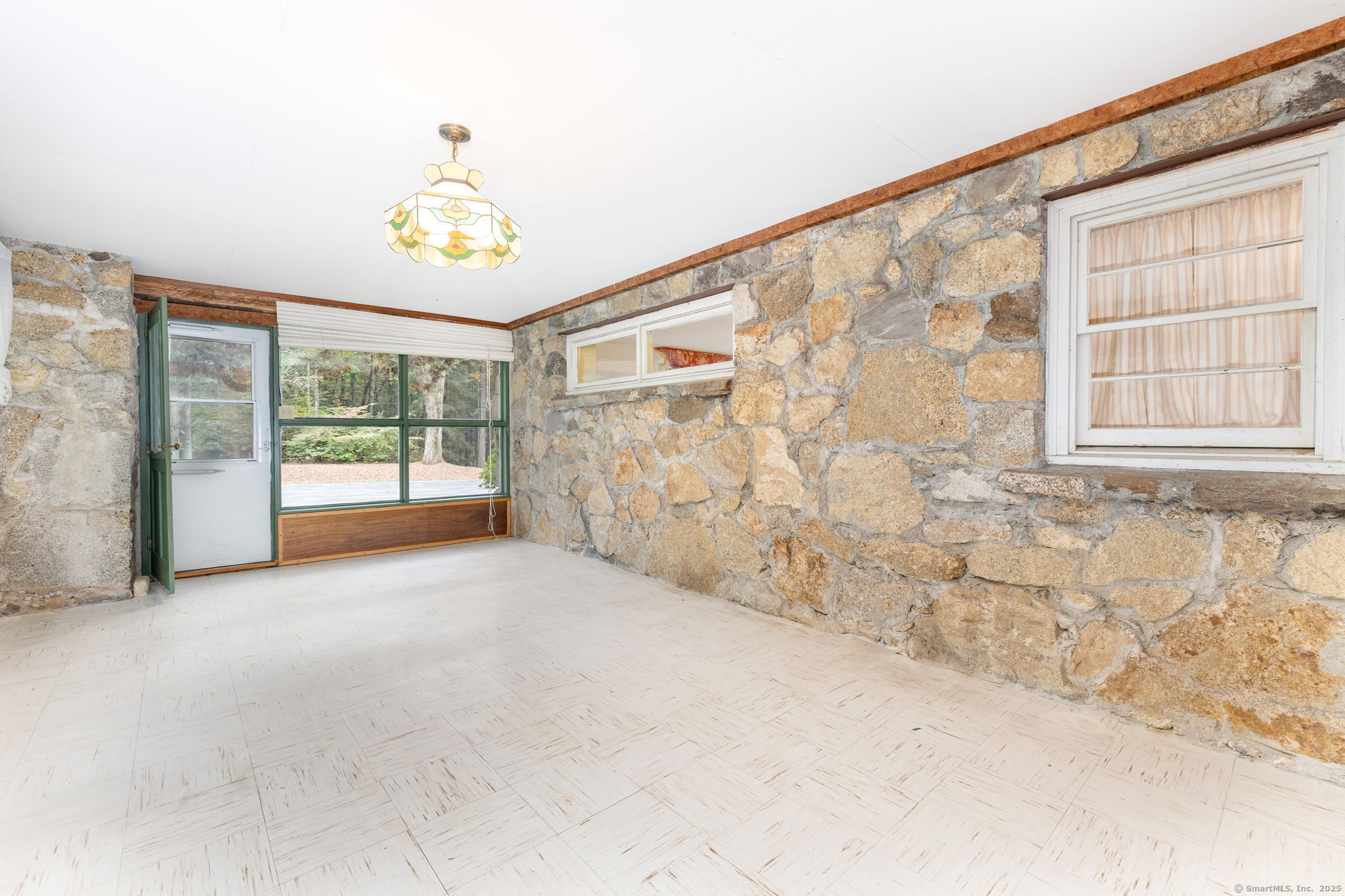 418 Plymouth Road Harwinton, CT 06791 - Photo 32 of 37 a view of an empty room with a window