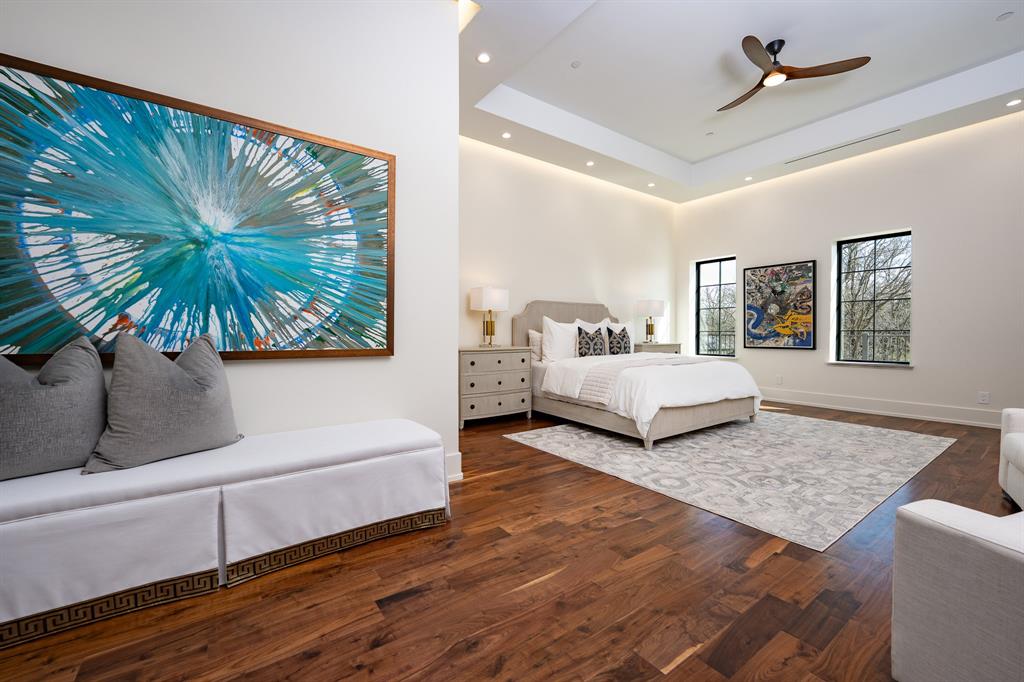 1230 Oak View Court Oak Point, TX 75068 - Photo 17 of 33 a living room with a bed and a couch