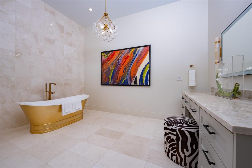 1230 Oak View Court Oak Point, TX 75068 - Photo 22 of 33 a bathroom with a sink a bathtub and a shower