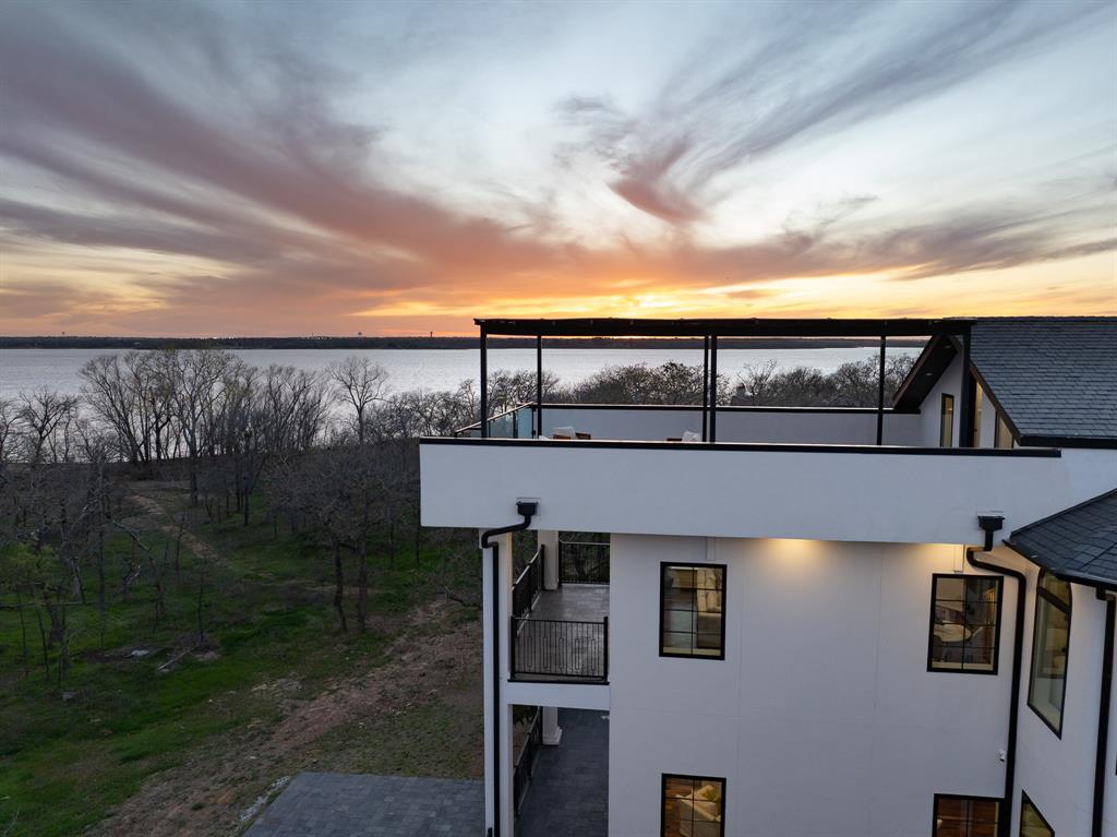 1230 Oak View Court Oak Point, TX 75068 - Photo 31 of 33 a view of a balcony with an outdoor space