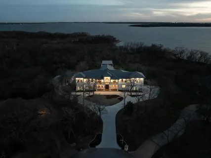 a view of a balcony with furniture