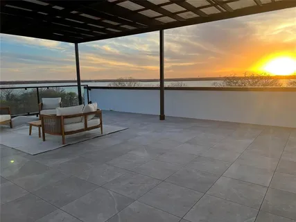 a view of a terrace with city view