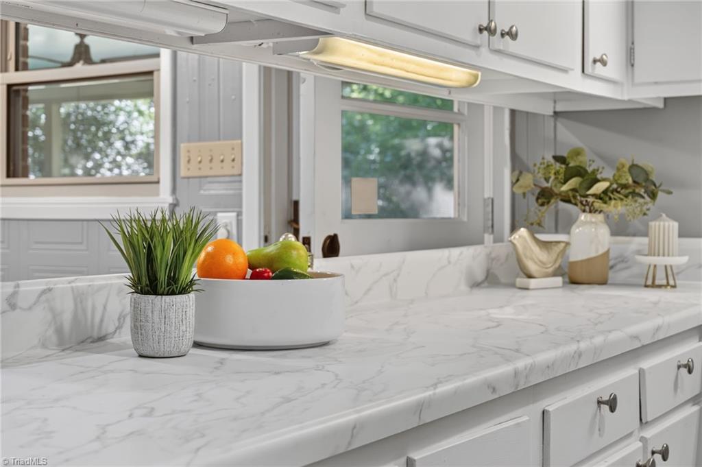 113 Green Valley Road Greensboro, NC 27403 - Photo 20 of 46 Clean lines, bright finishes, and timeless style create a kitchen that feels fresh today and ready for tomorrow.