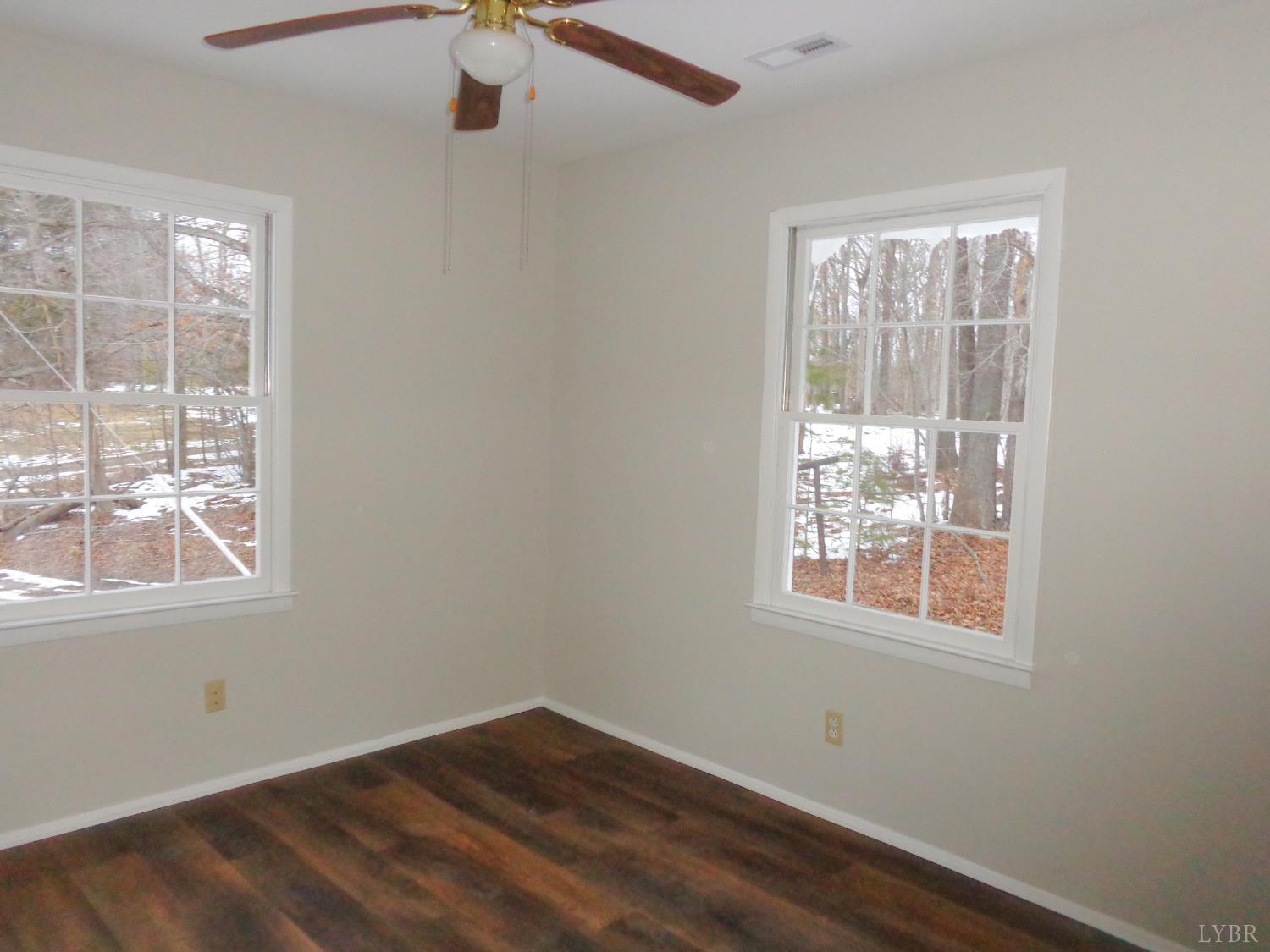 1136 Staunton Hill Road Brookneal, VA 24528 - Photo 16 of 22 an empty room with a window