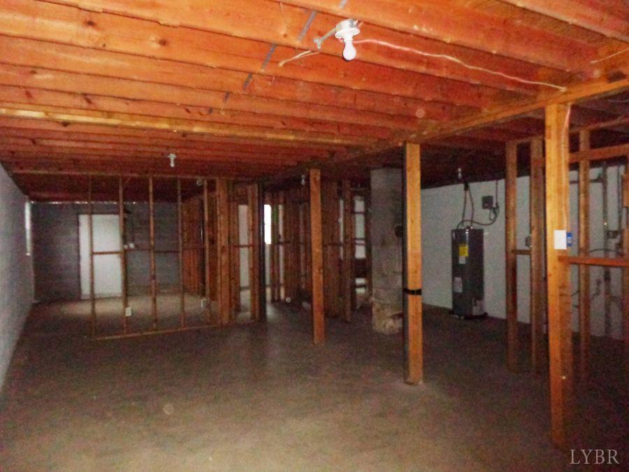 1136 Staunton Hill Road Brookneal, VA 24528 - Photo 17 of 22 a view of a room with wooden walls