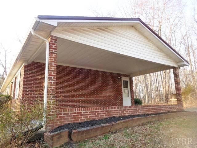 1136 Staunton Hill Road Brookneal, VA 24528 - Photo 3 of 22 a view of a house with a small backyard