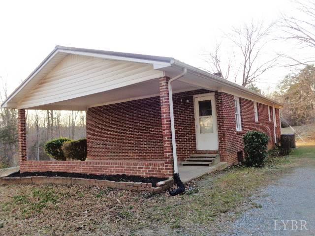 1136 Staunton Hill Road Brookneal, VA 24528 - Photo 5 of 22 a view of a house with a yard