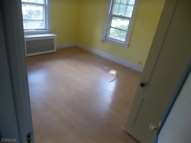 a bathroom with a toilet sink and shower