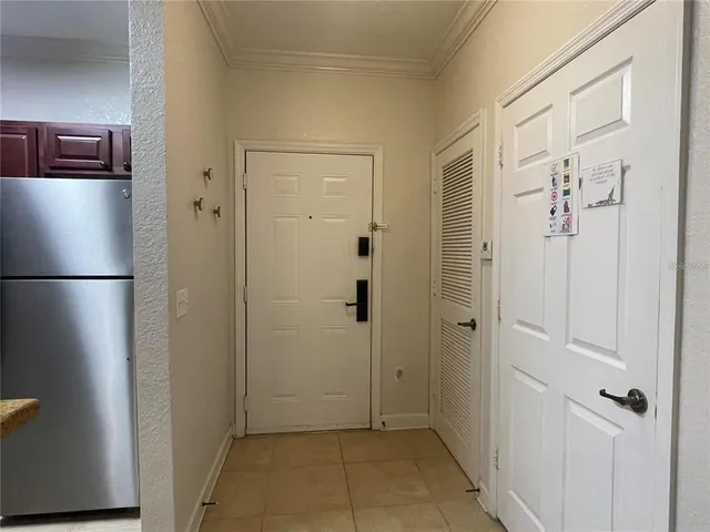 a bathroom with a granite countertop shower and a sink