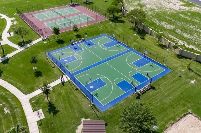 an aerial view of a mini pool table and chairs