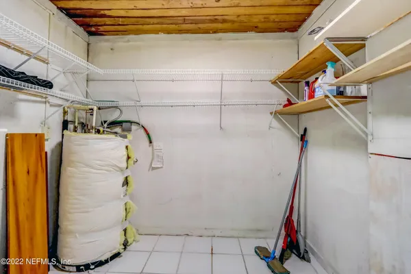 a view of a house with garden and plants