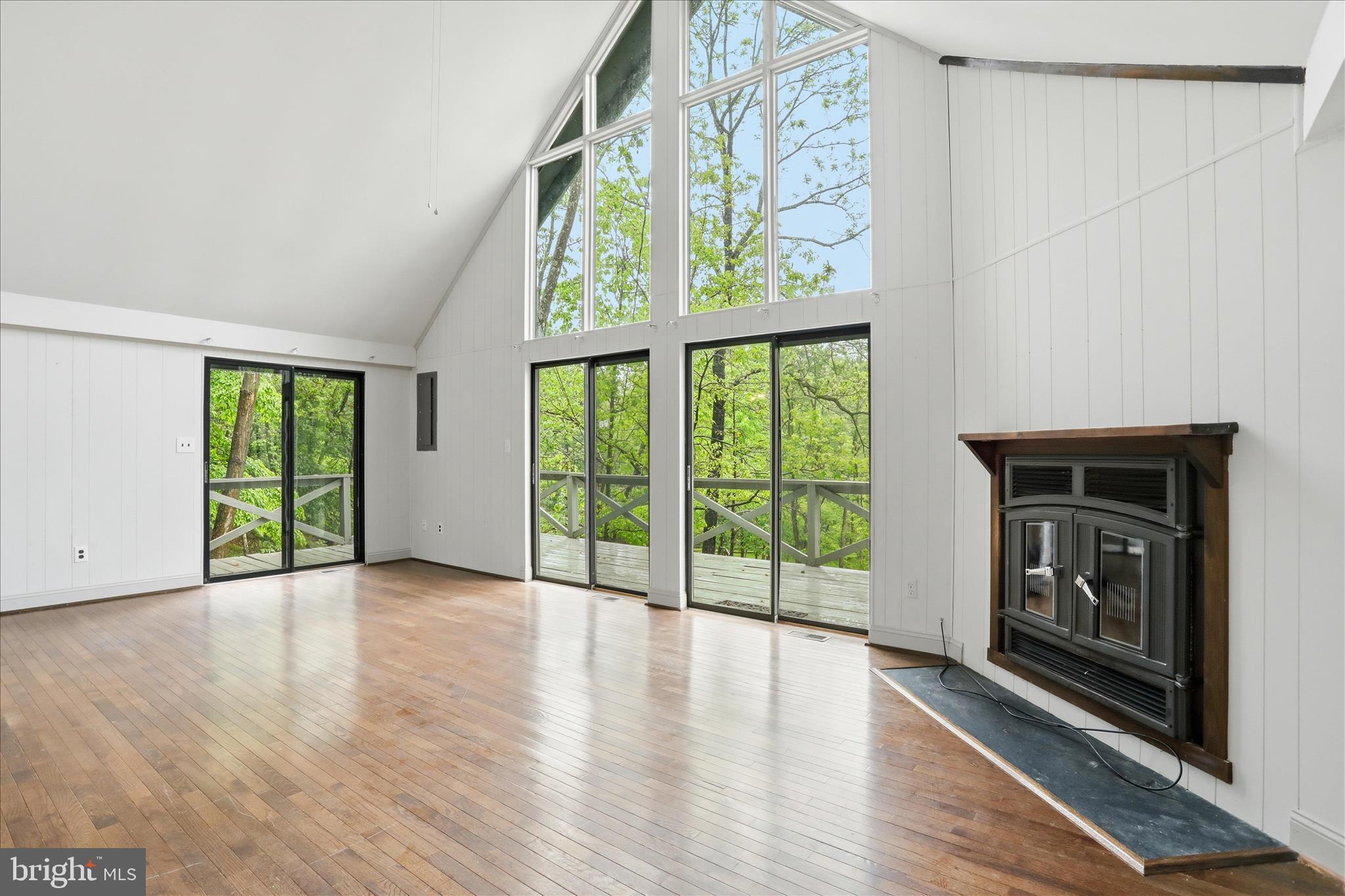 578 Walden Road Hedgesville, WV 25427 - Photo 39 of 39 a view of an empty room with wooden floor and a window