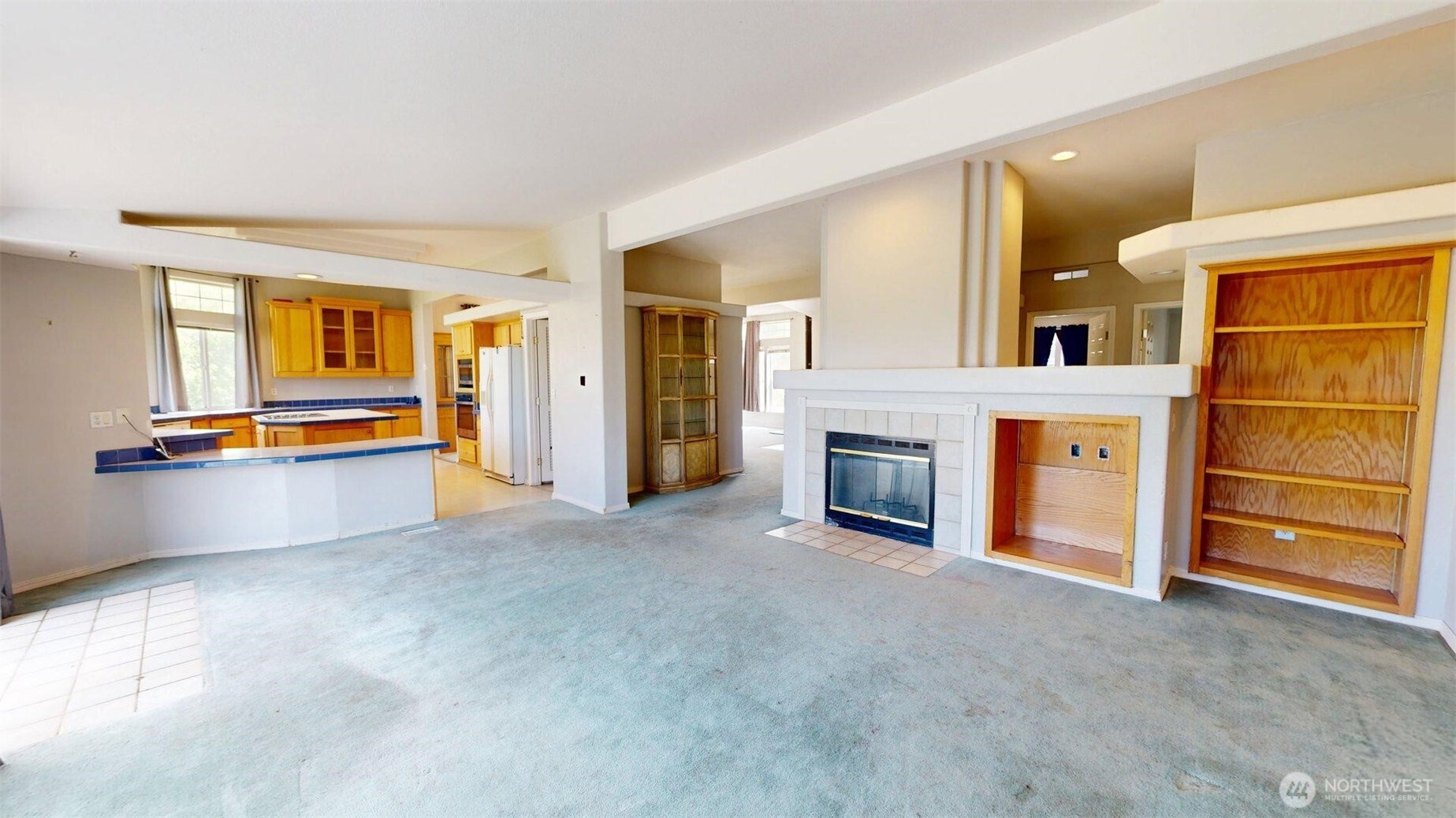 142 Fletcher Road Oroville, WA 98844 - Photo 10 of 26 a view of a livingroom with a fireplace