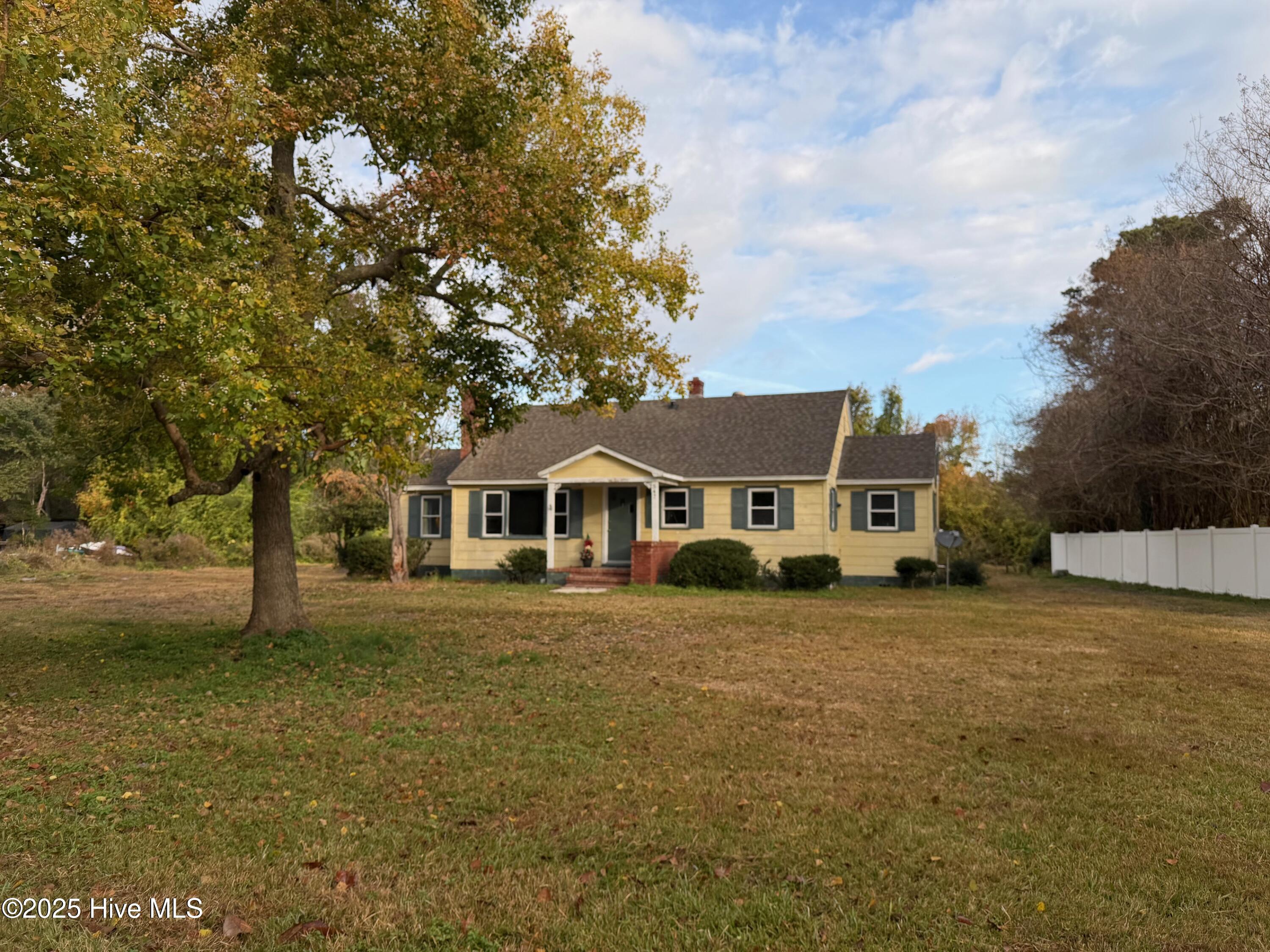 547 Pigott Road Gloucester, NC 28528 - Photo 15 of 18 Privacy fence on right side of yard