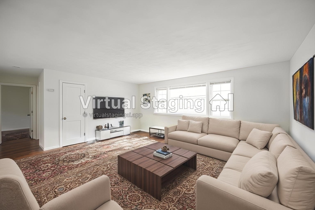 a living room with furniture and a couch