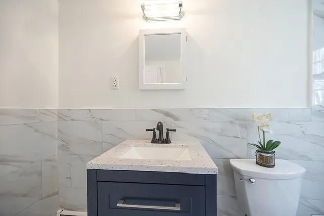 a bathroom with a sink and a toilet