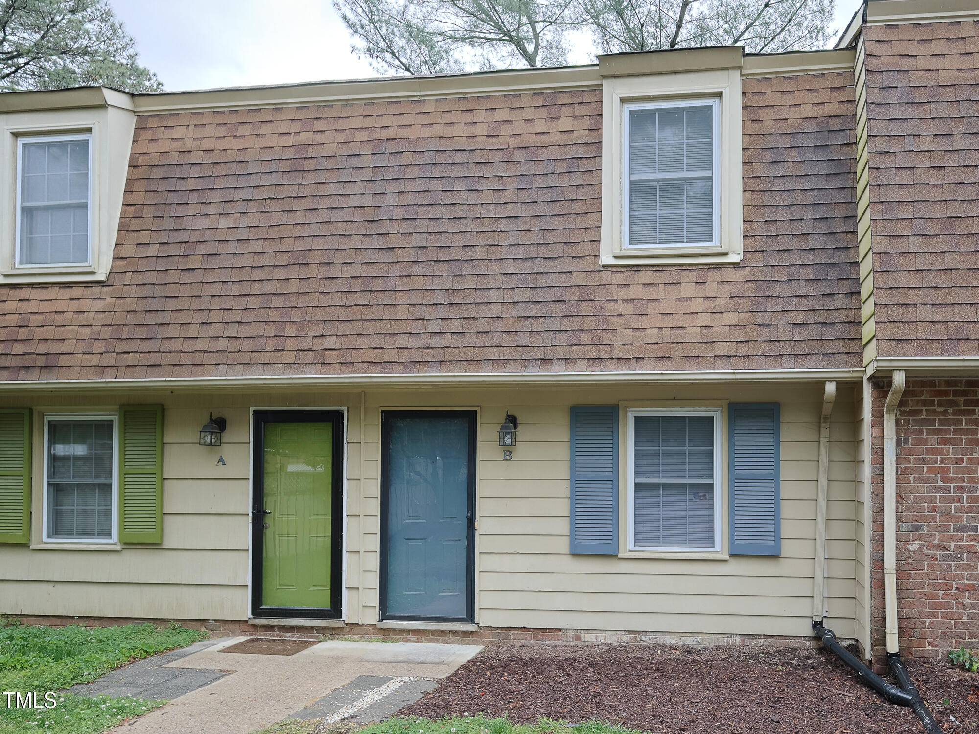4816 Blue Bird Court, Unit B Raleigh, NC 27606 - Photo 28 of 32 127_4816_Blue_Bird_Ct_BFront_of_House