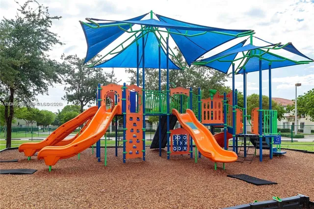 a view of park with kids yard