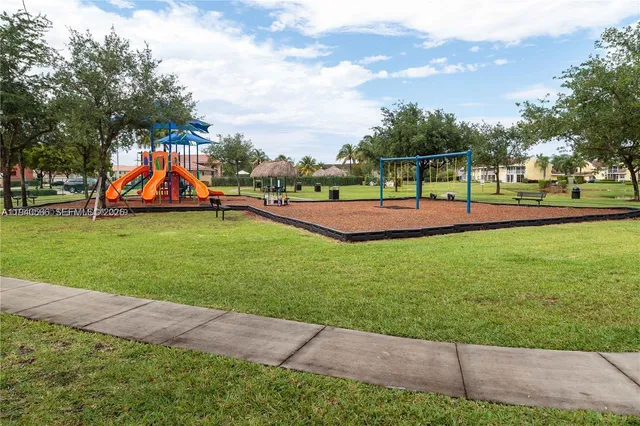 a view of house with outdoor seating space