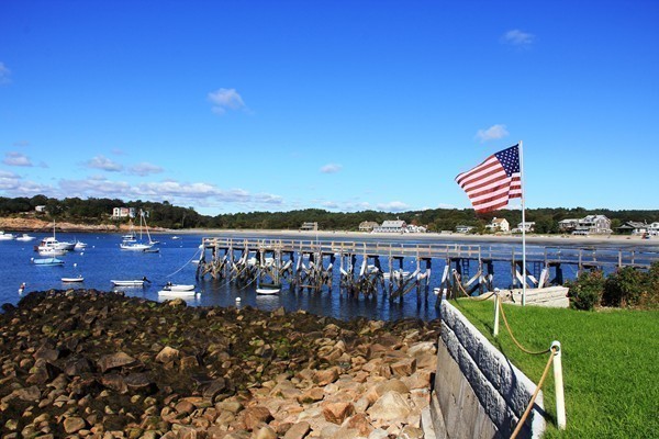 52 Shore Road Gloucester, MA 01930 - Photo 15 of 22 a view of a chairs and table on the wooden floor