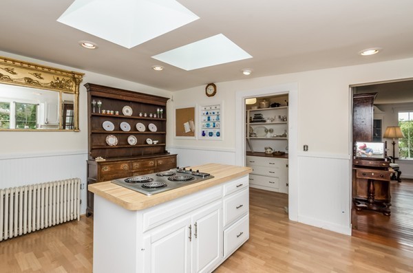 52 Shore Road Gloucester, MA 01930 - Photo 19 of 22 a kitchen with stainless steel appliances granite countertop a stove and a refrigerator