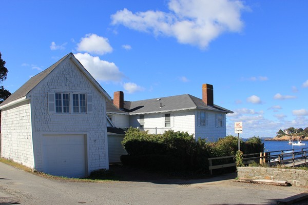 52 Shore Road Gloucester, MA 01930 - Photo 2 of 22 a front view of a house with parking space
