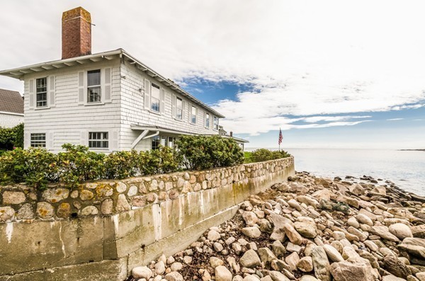 52 Shore Road Gloucester, MA 01930 - Photo 4 of 22 a front view of a house with a yard