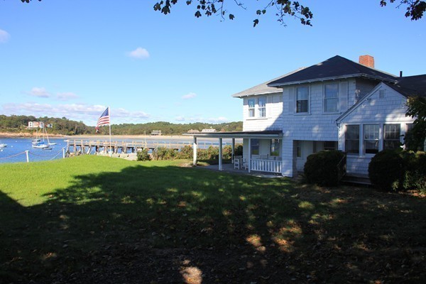 52 Shore Road Gloucester, MA 01930 - Photo 7 of 22 a view of a house with a yard