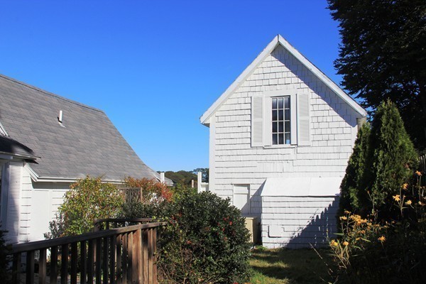 52 Shore Road Gloucester, MA 01930 - Photo 9 of 22 a view of a house with a yard
