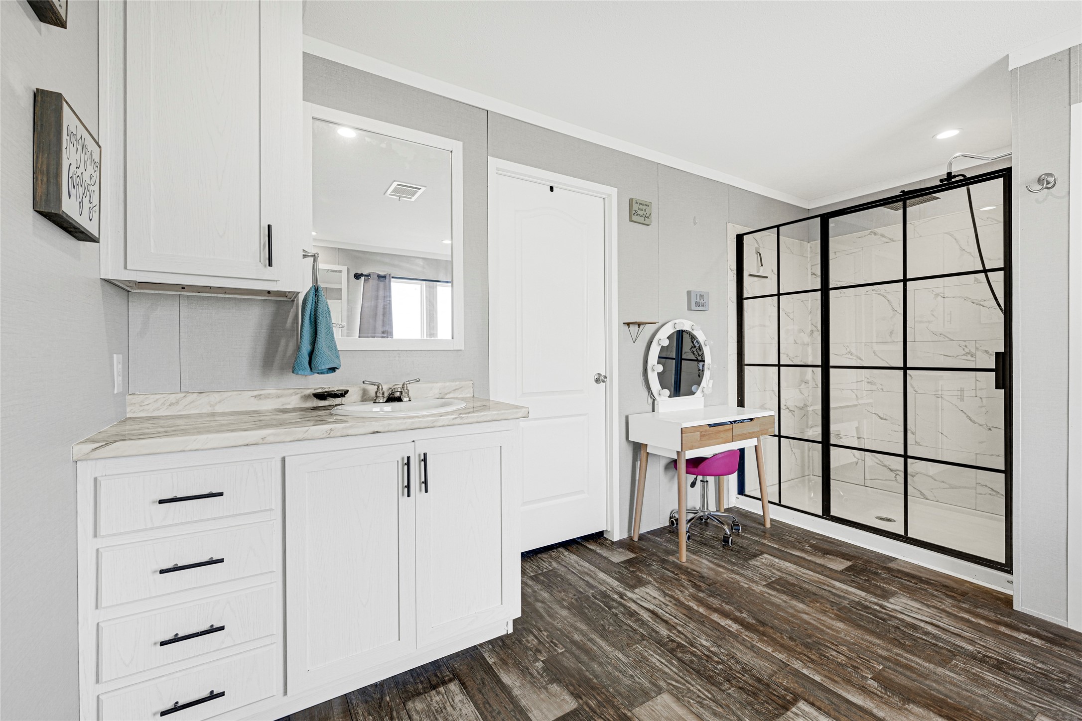 2105 Eagle Road Anahuac, TX 77514 - Photo 36 of 44 a utility room with cabinets