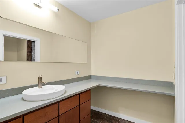 a view of an empty room with a fireplace