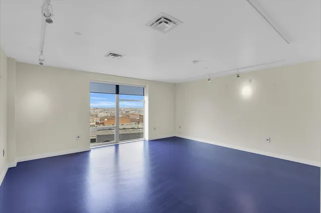 a view of a building with door and windows