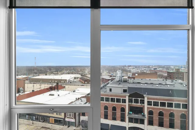 a kitchen with stainless steel appliances granite countertop a sink and a stove top oven