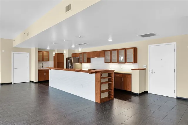 a view of an empty room and window