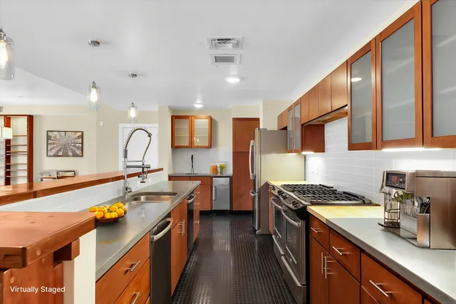 a bedroom with a bed and a potted plant