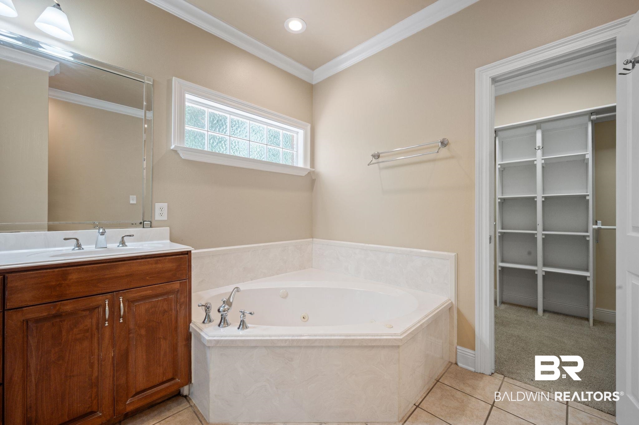 2041 Ridgeline Drive Mobile, AL 36695 - Photo 15 of 43 Bathroom with tile patterned floors, crown molding, a bath, and vanity