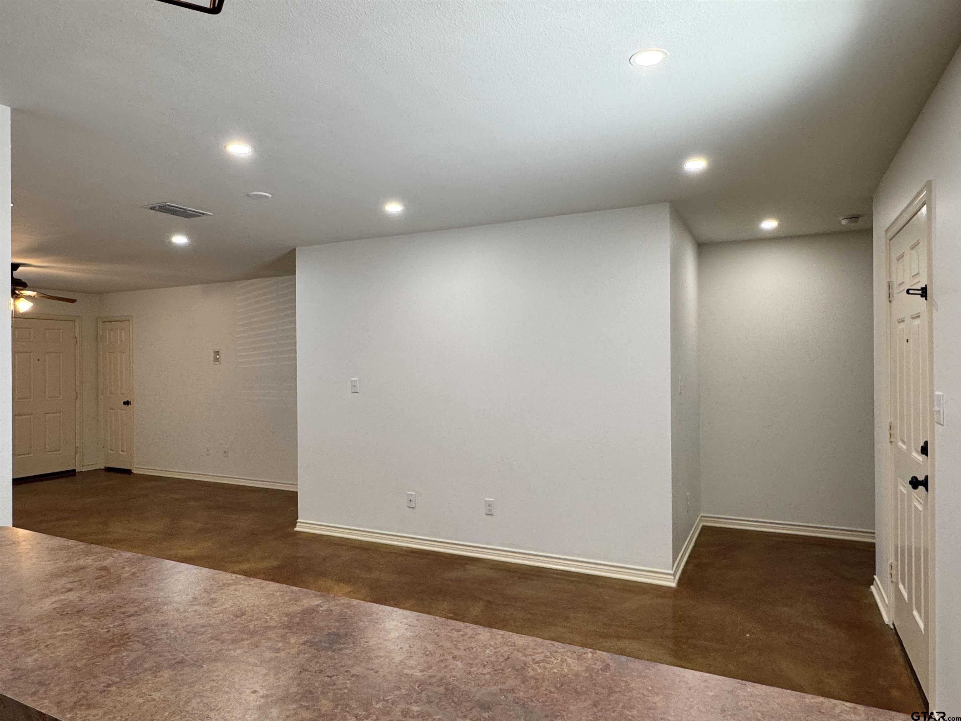 13343 Country Meadow Lane Lindale, TX 75771 - Photo 10 of 20 an empty room with wooden floor